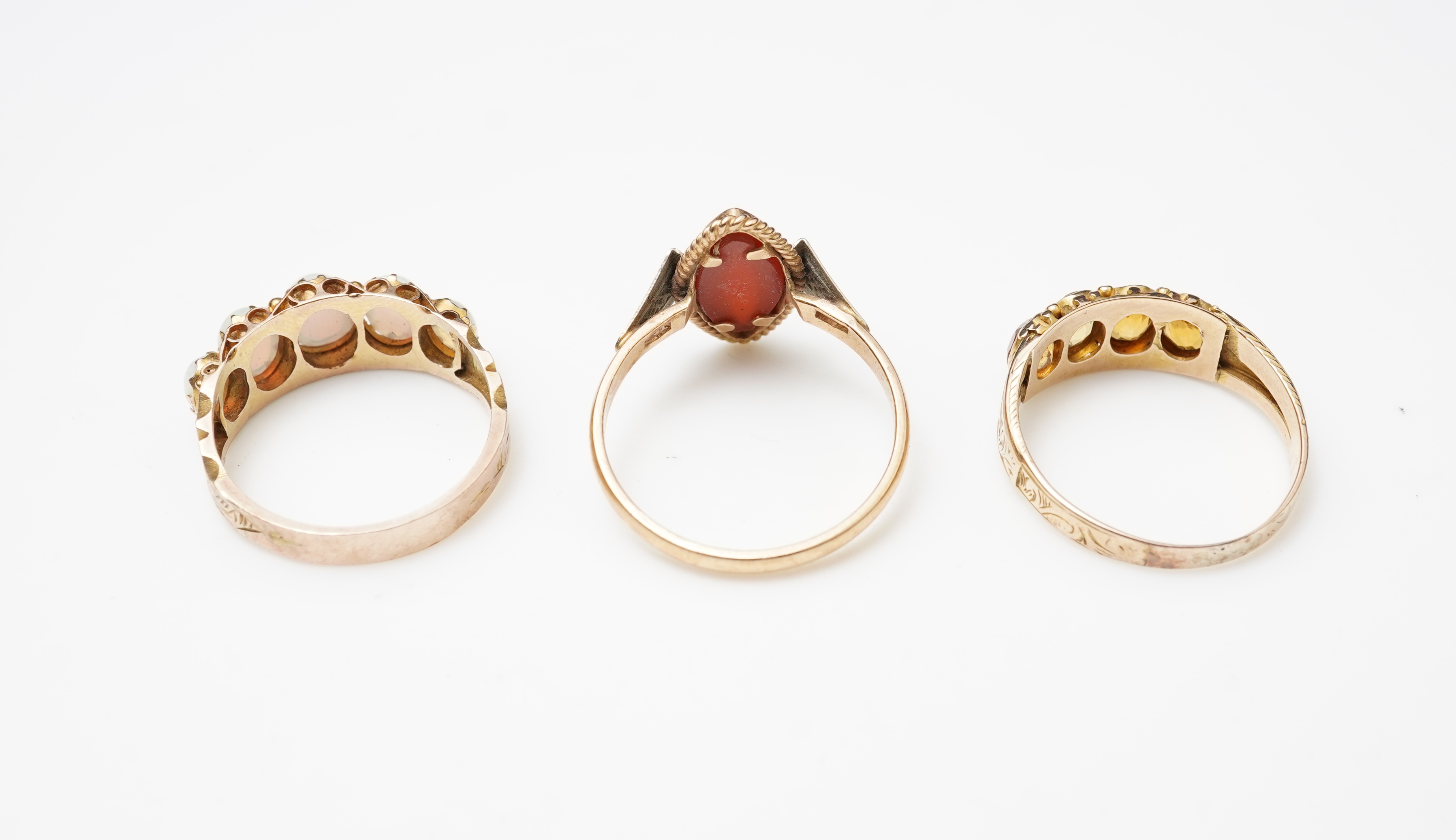Three gem-set rings
